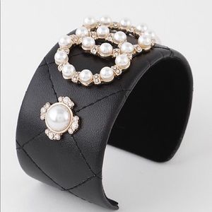 Open black bleary/gold studded bracelets